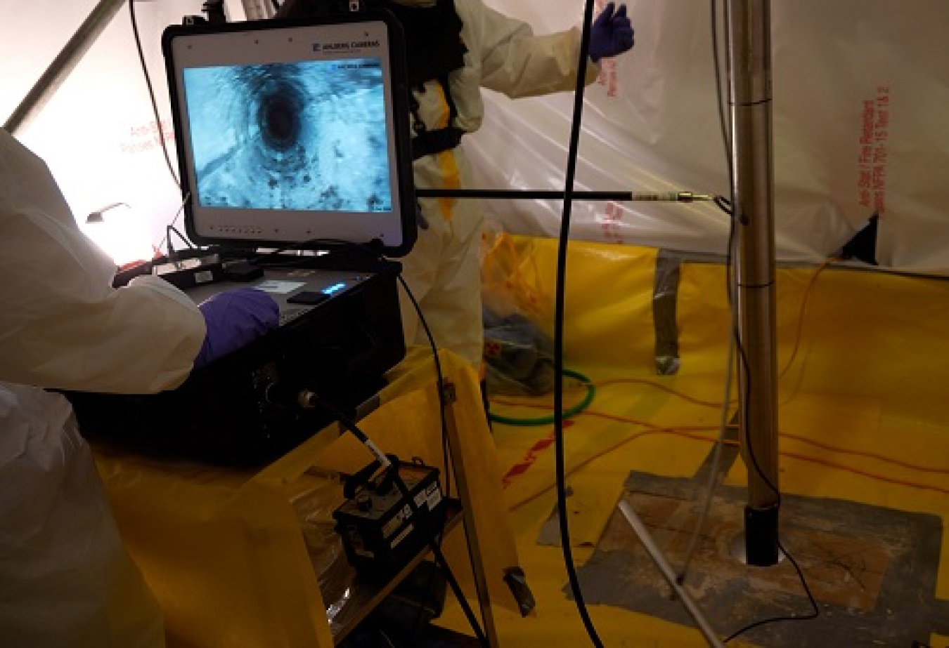 Teams drilled through concrete covers of the hot cells to gather remote video footage and perform initial radiological surveys.
