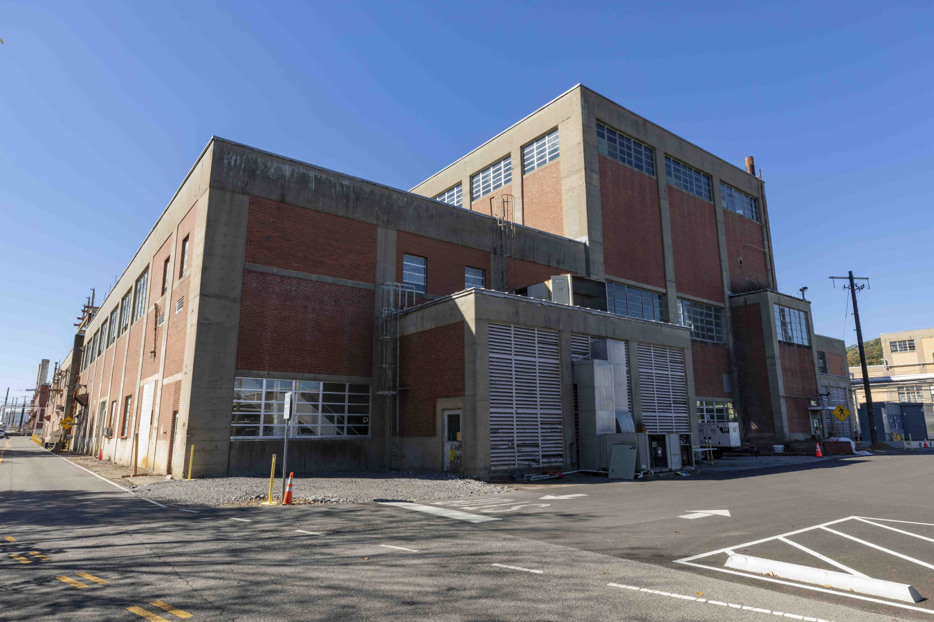 Exterior of a large brick facility building