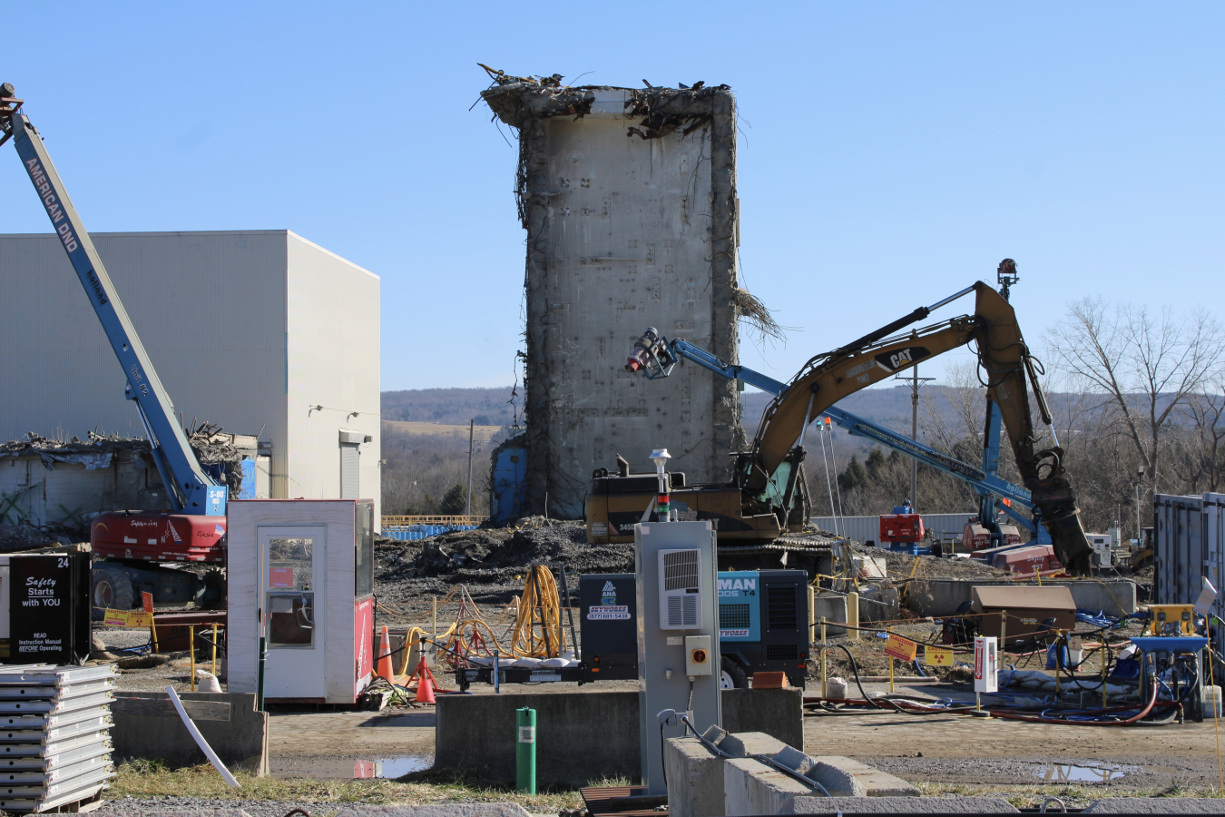 Completed demolition of a part of a building. Some of the building remains standing