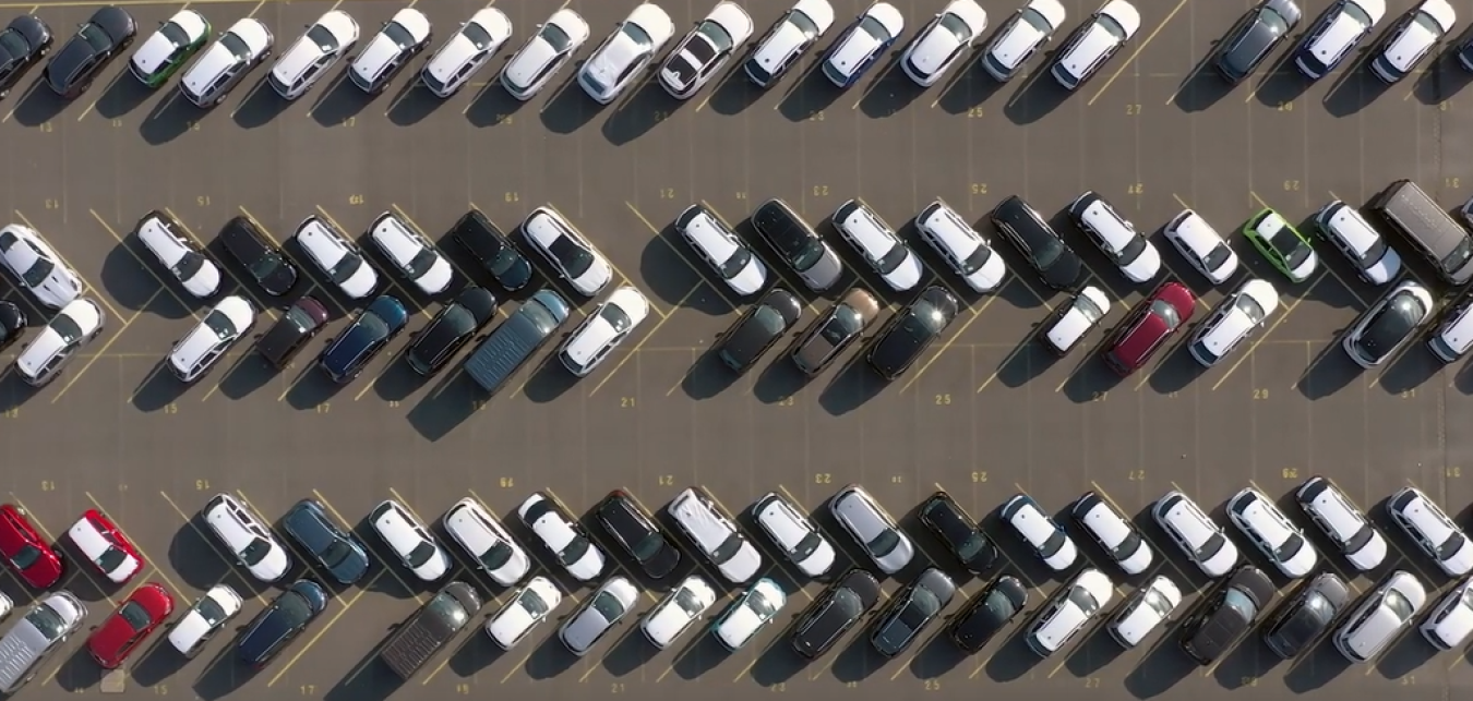 Aerial view of cars in parking lot
