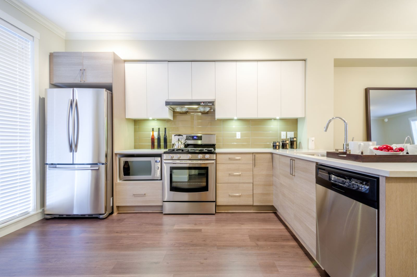 Kitchen with modern appliances and hardwood floor
