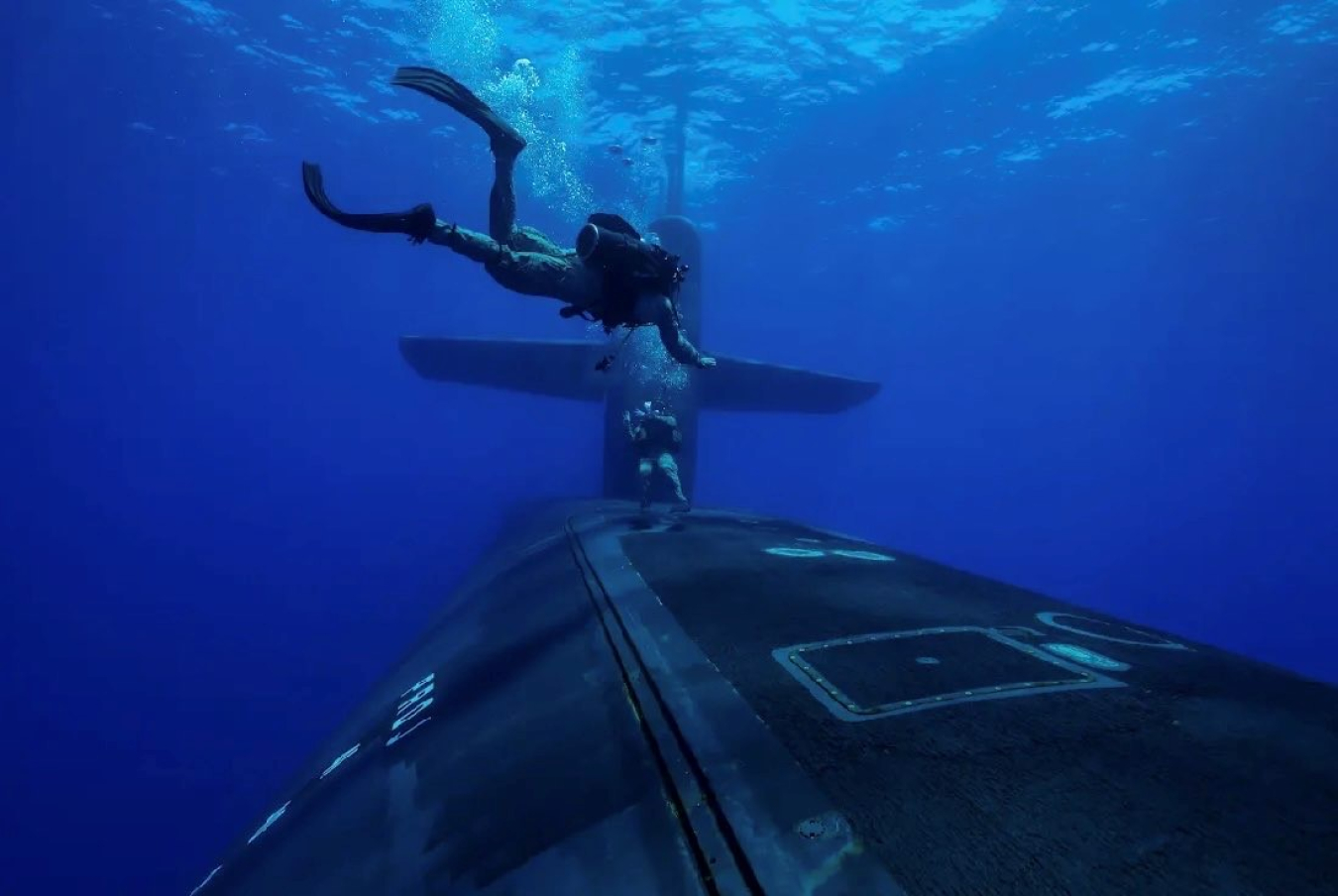 Divers Outside Nuclear Submarine