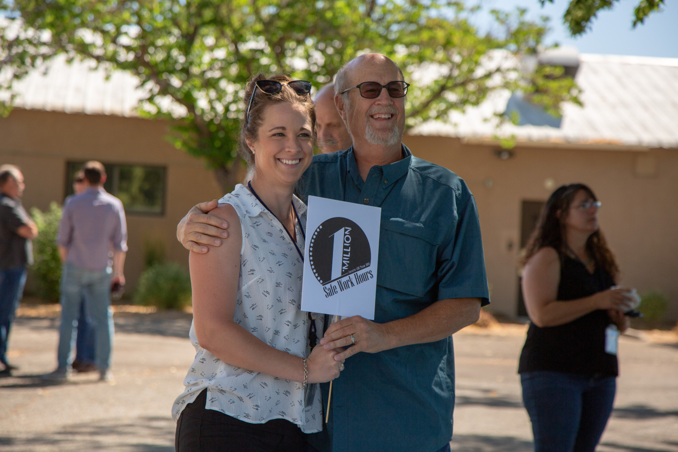 LM Site Manager Sara Woods and her father, LMSP hydrogeologist Dan Sellers, celebrate a safety milestone at LM’s Field Support Center in Grand Junction, Colorado.