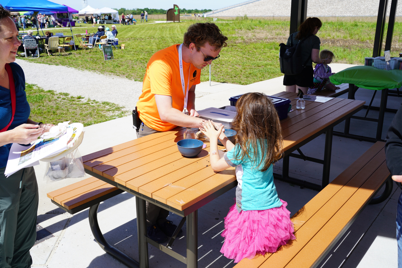 Younger visitors built seed balls for planting at home with help from Weldon Spring Site Interpretive Center staff members.