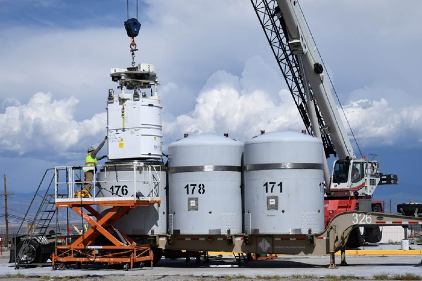 EM-LA crew members prepare the first corrugated metal pipe (CMP) transuranic waste stream shipment for permanent disposal at the Waste Isolation Pilot Plant.