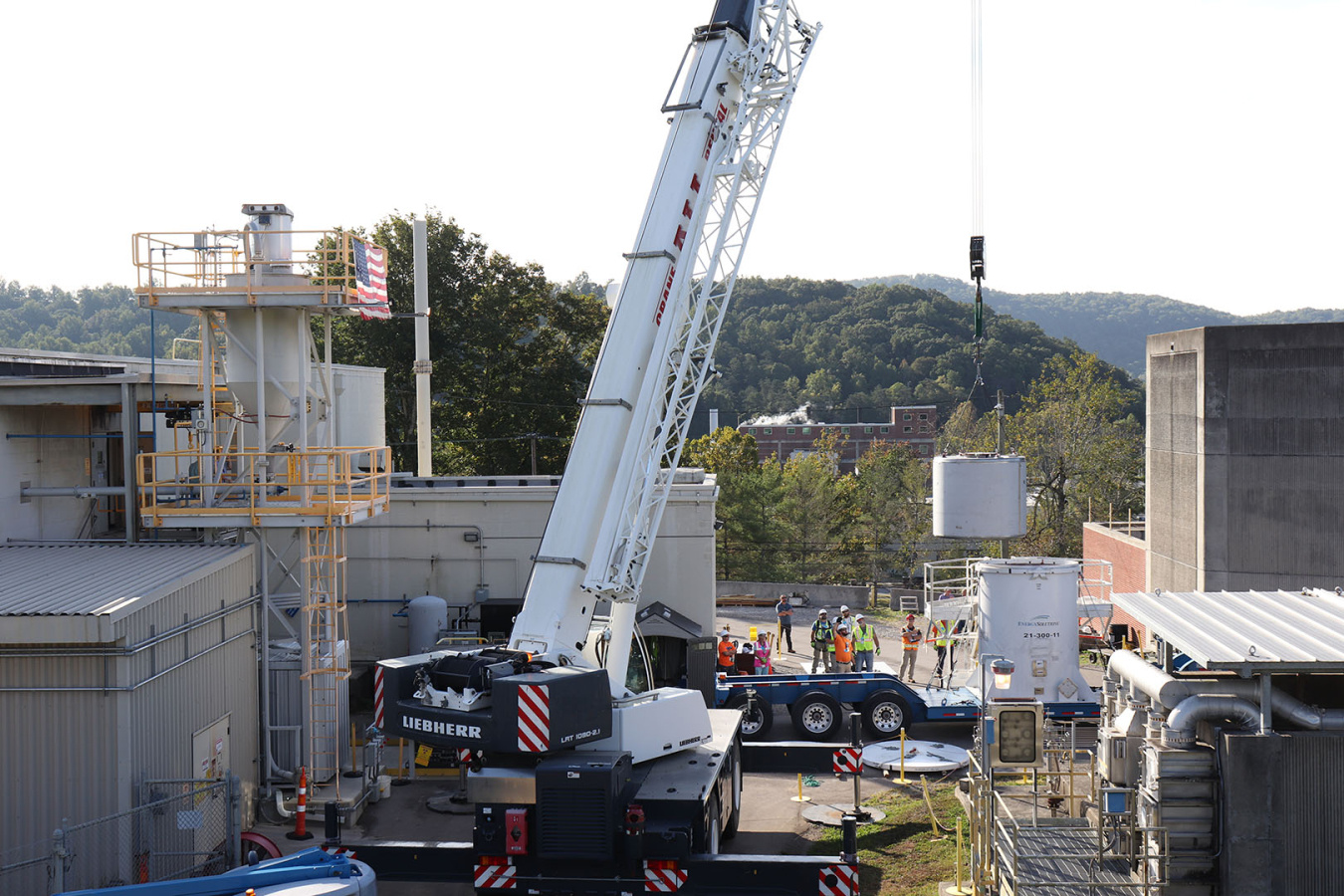 A large white crane carrying out work at the Oak Ridge Site