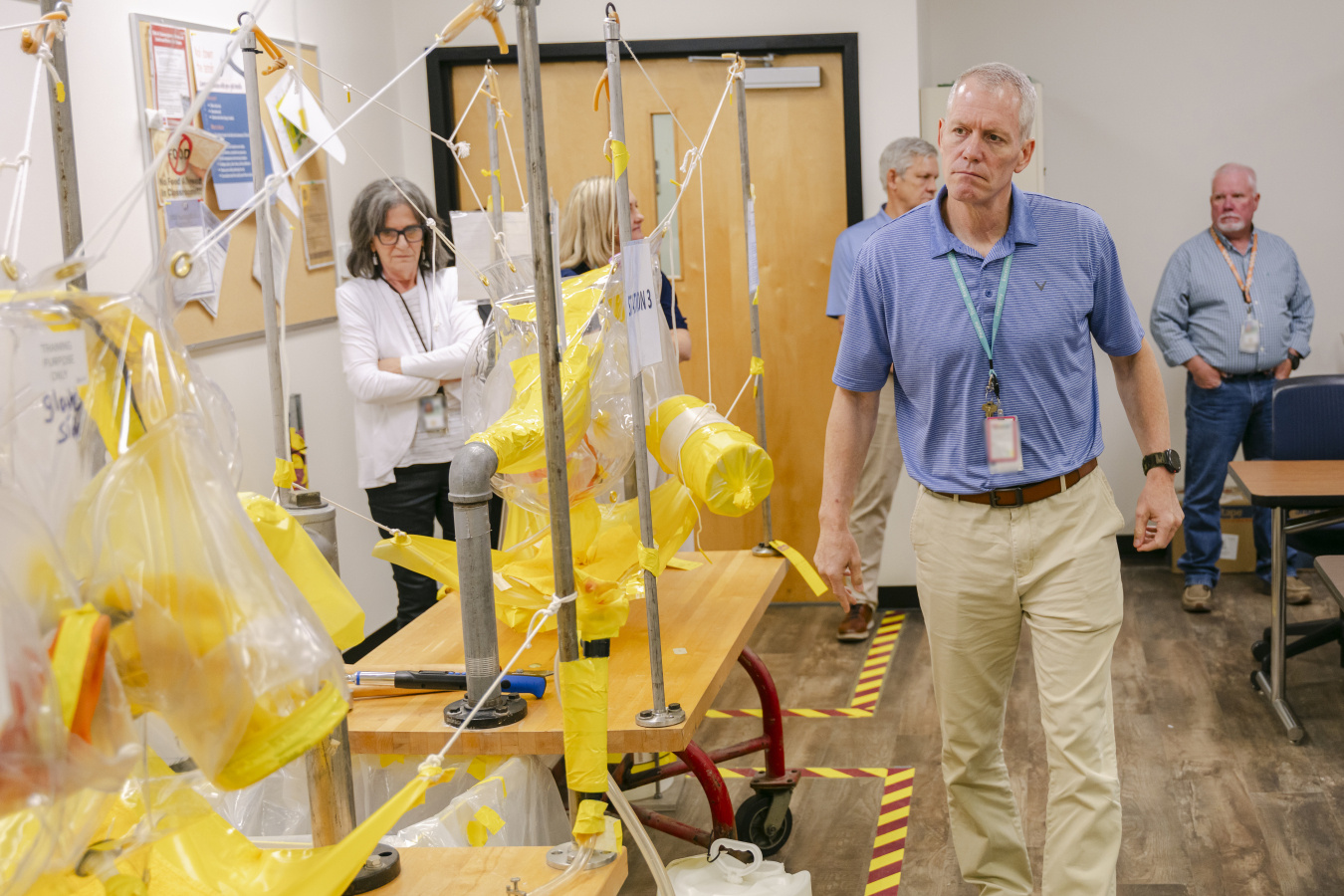 Employees walking through a training facility 