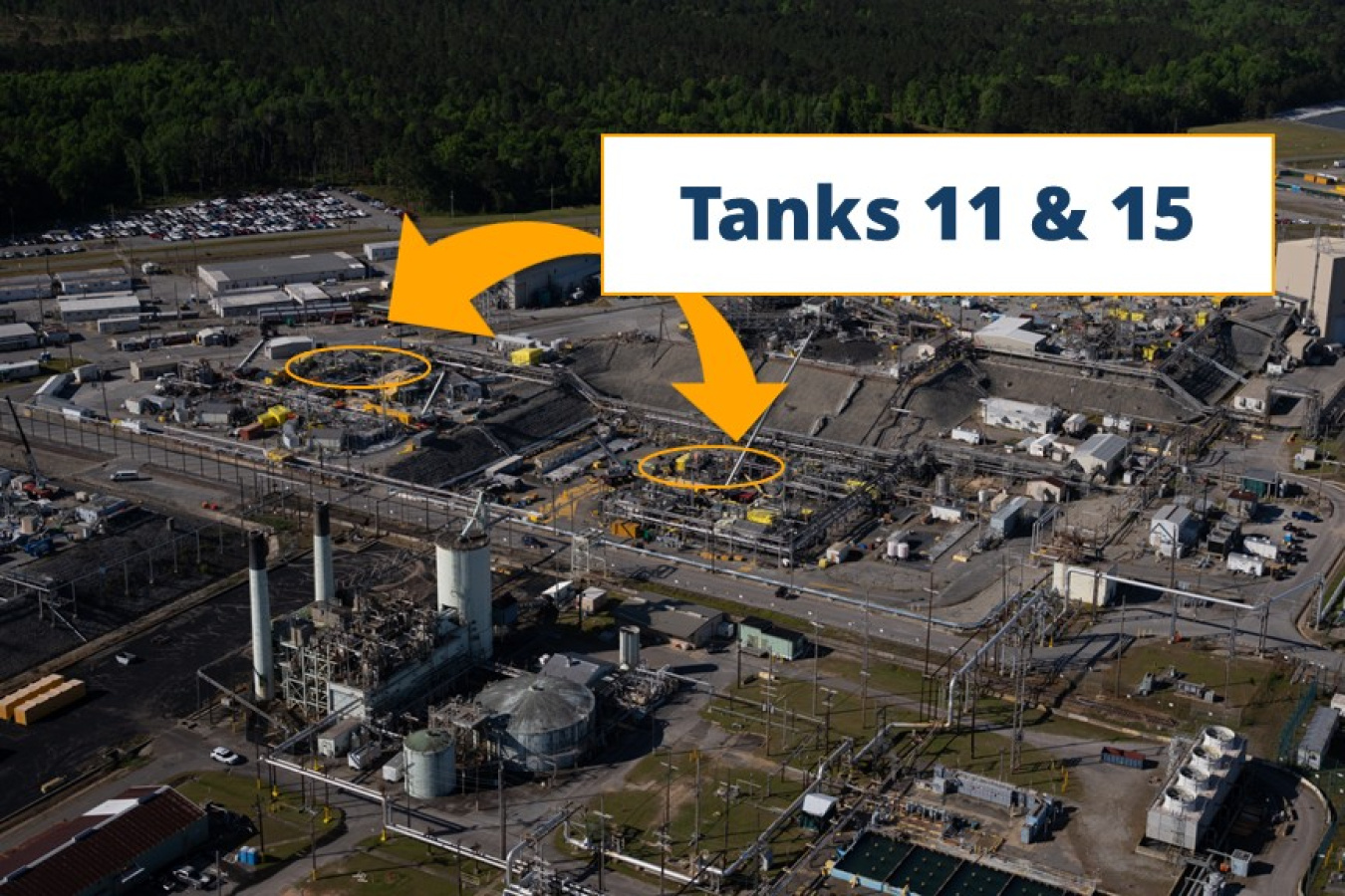 An aerial view of the Savannah River Site with two yellow areas pointing out tanks 11 and 12