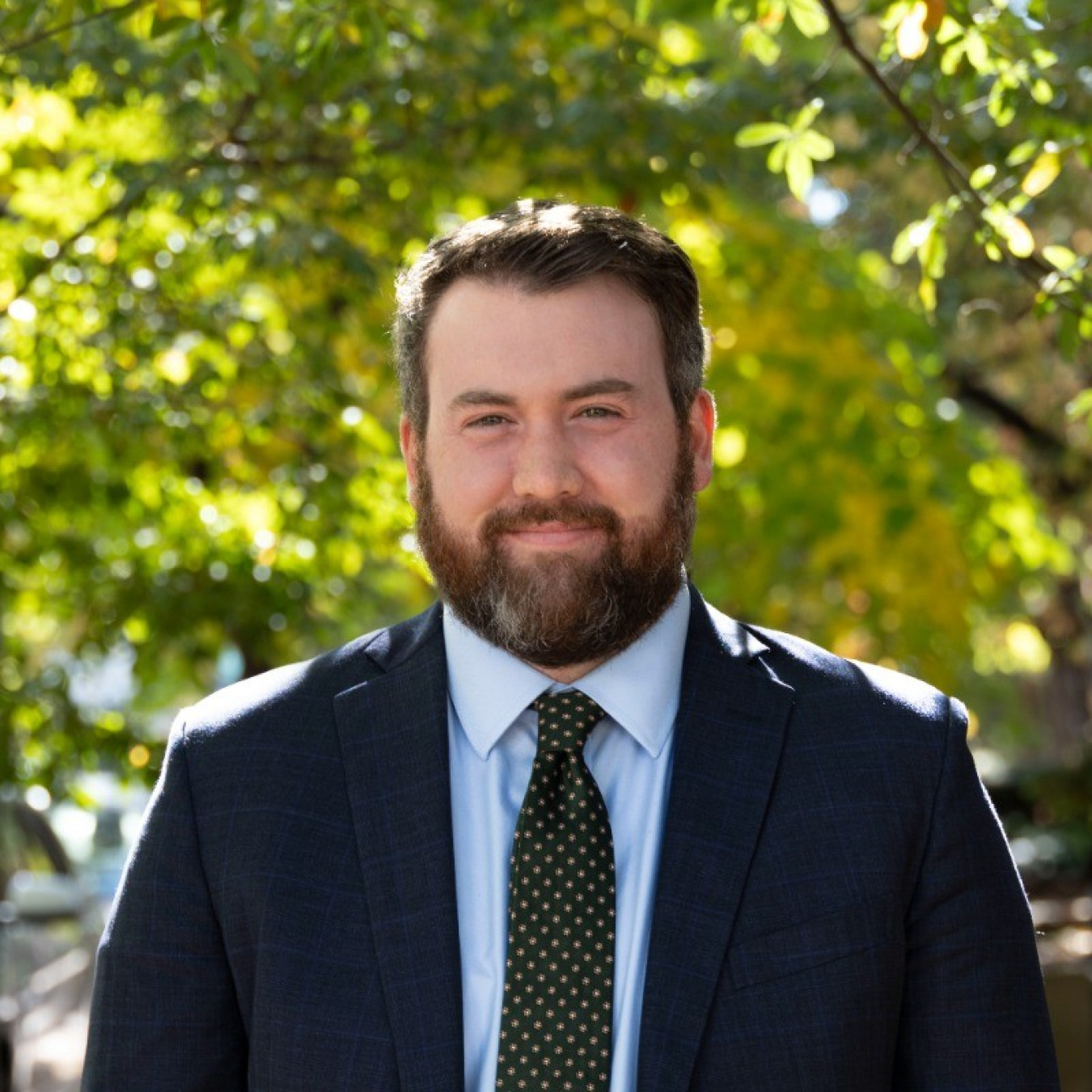 A headshot of Michael Helmer