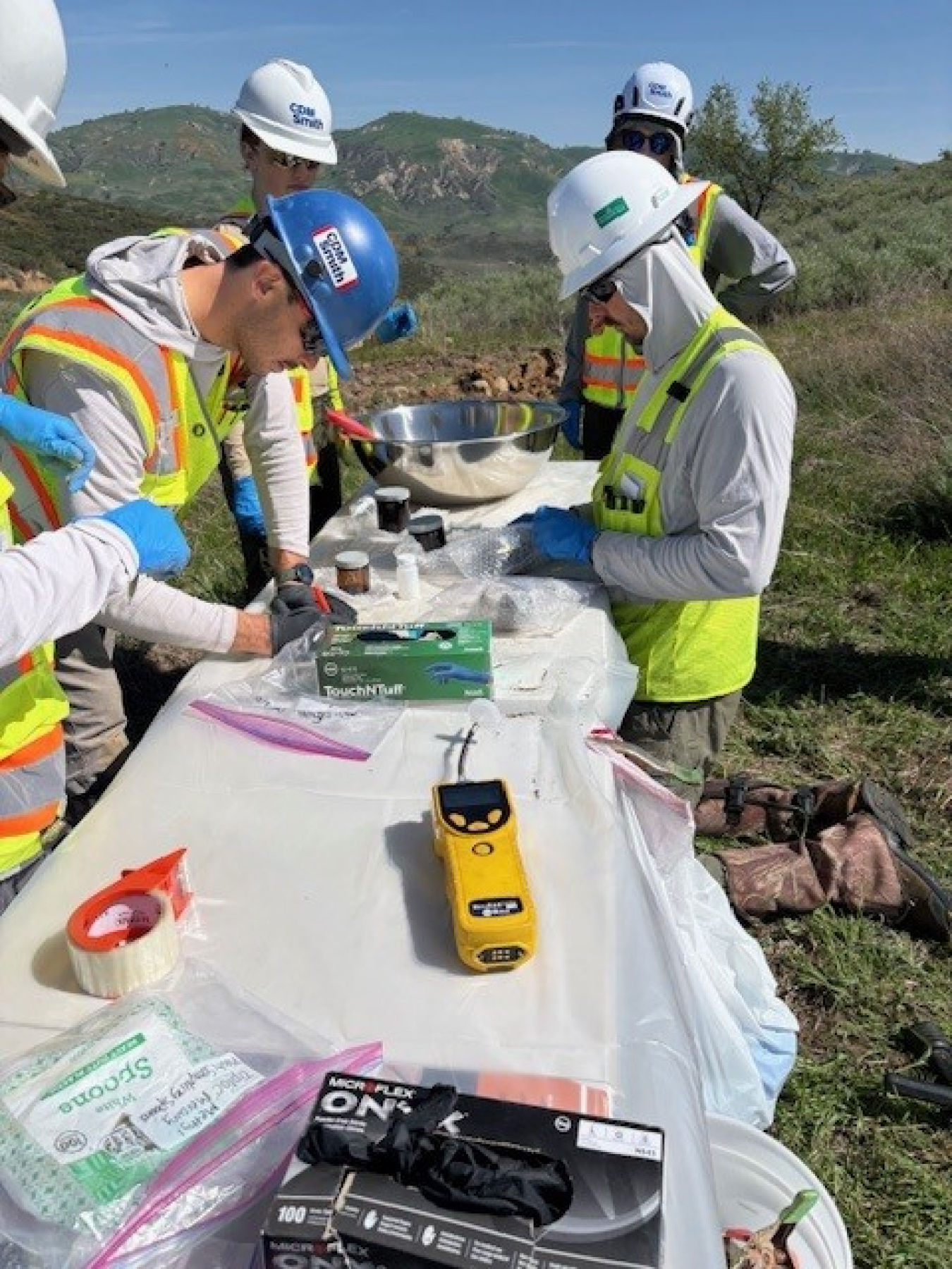People pack and label soil samples