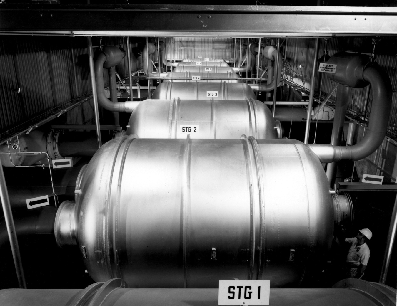 Rows of horizontal metal cylinders used in gaseous diffusion uranium enrichment.