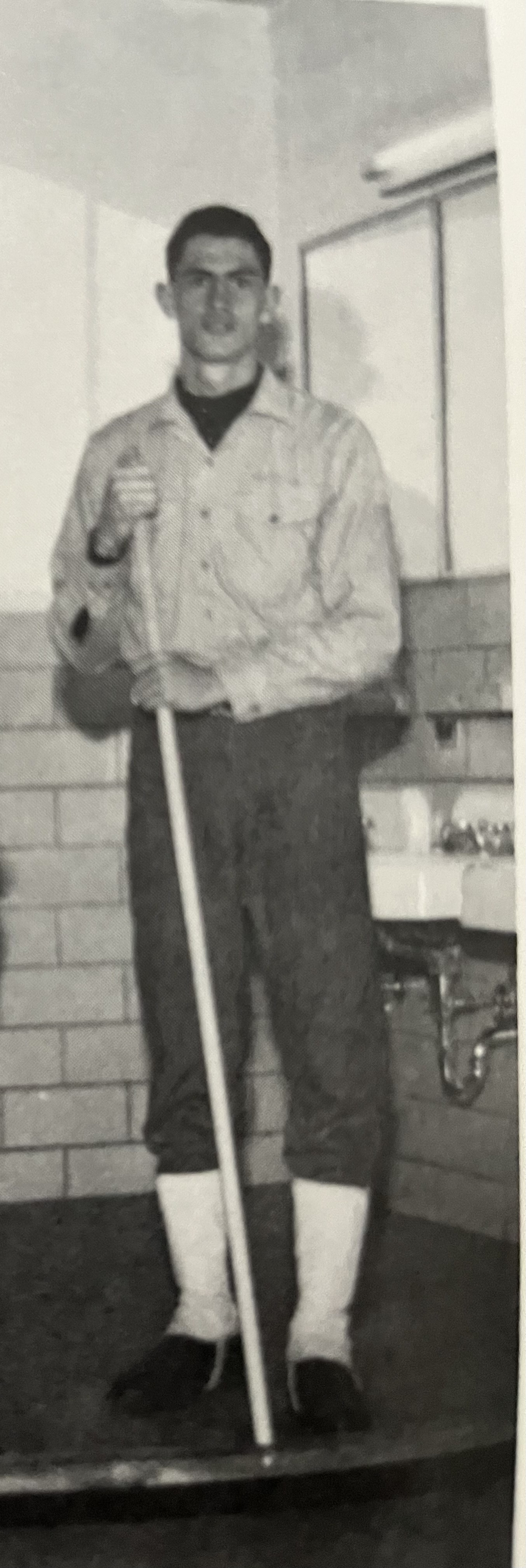 Casey swabbing the bathroom