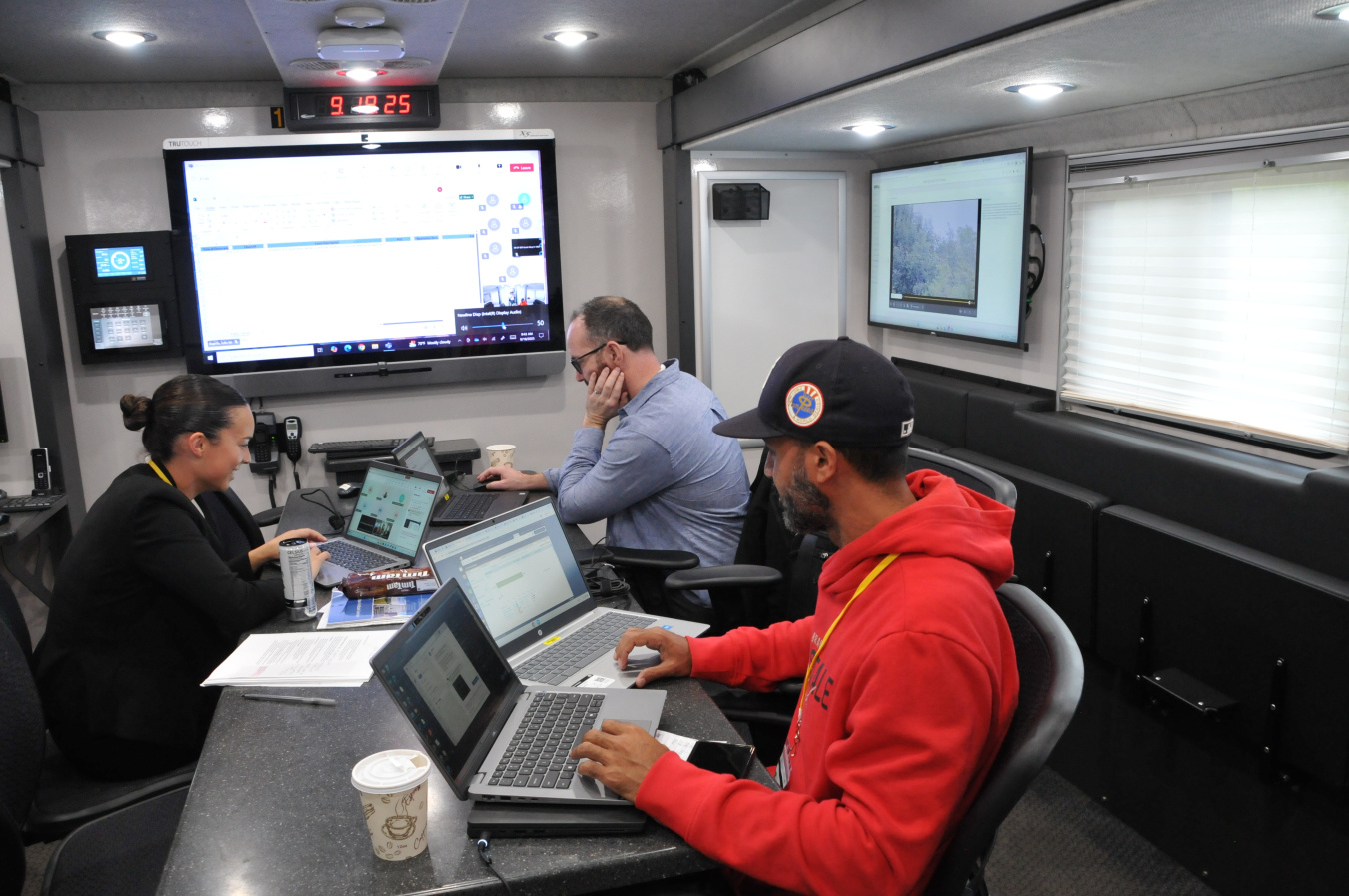 Cyber professionals collaborate in the Eversource Mobile Response Center (MRC) in their fight against the Liberty Eclipse Exercise Red Team