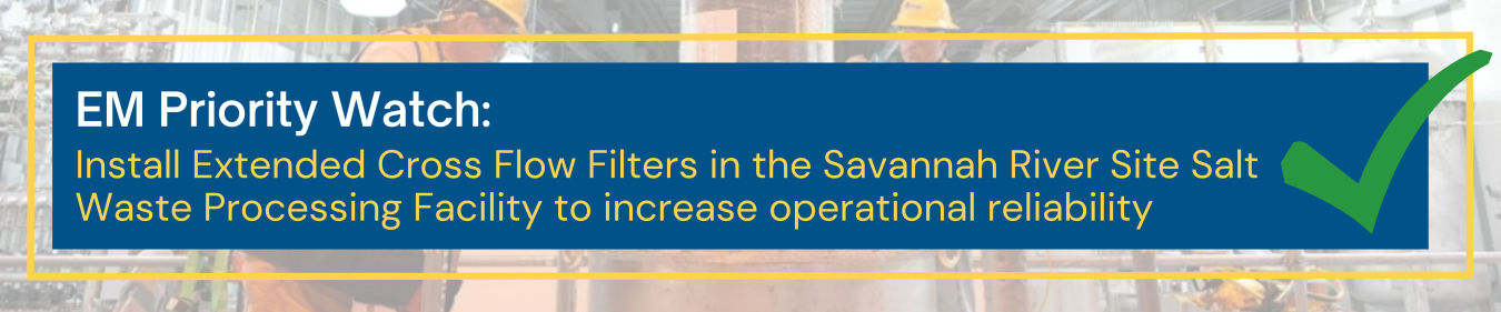 A blue EM priority watch banner with white and yellow text and a green check mark on the right side