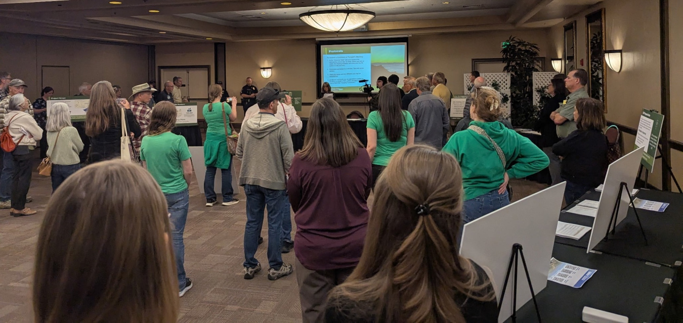People gathered at public meeting