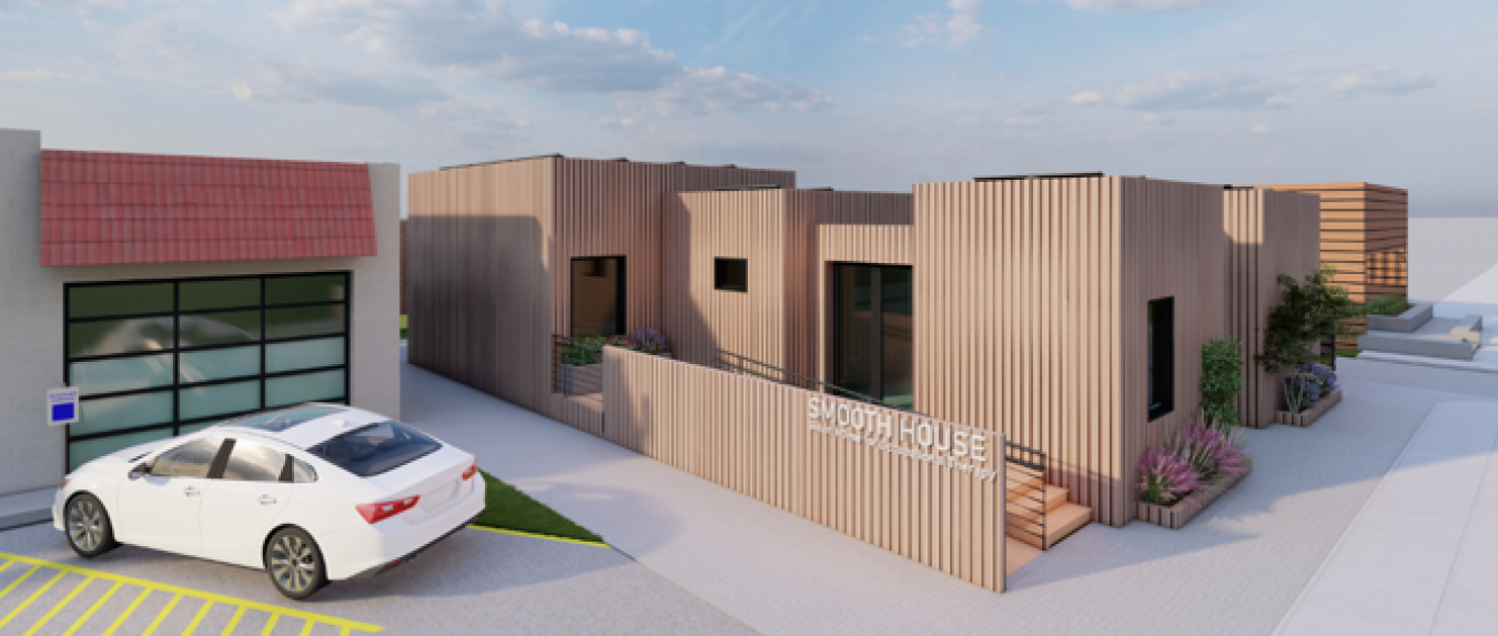 Architectural drawing of the team's house with a car parked nearby, at the door of a garage.