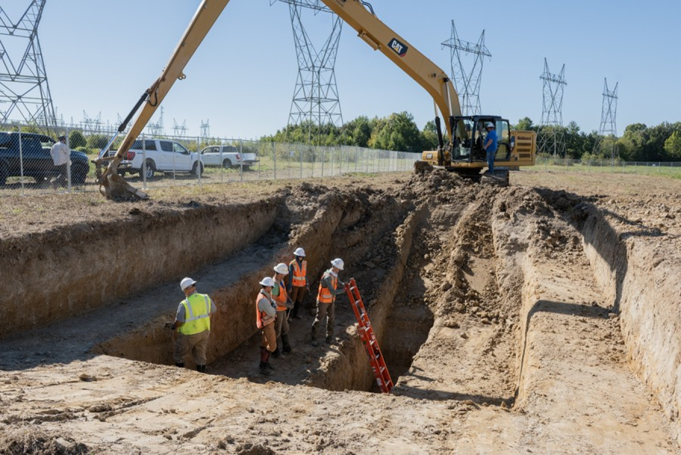 Workers conducting work inside a trench at the Paducah site