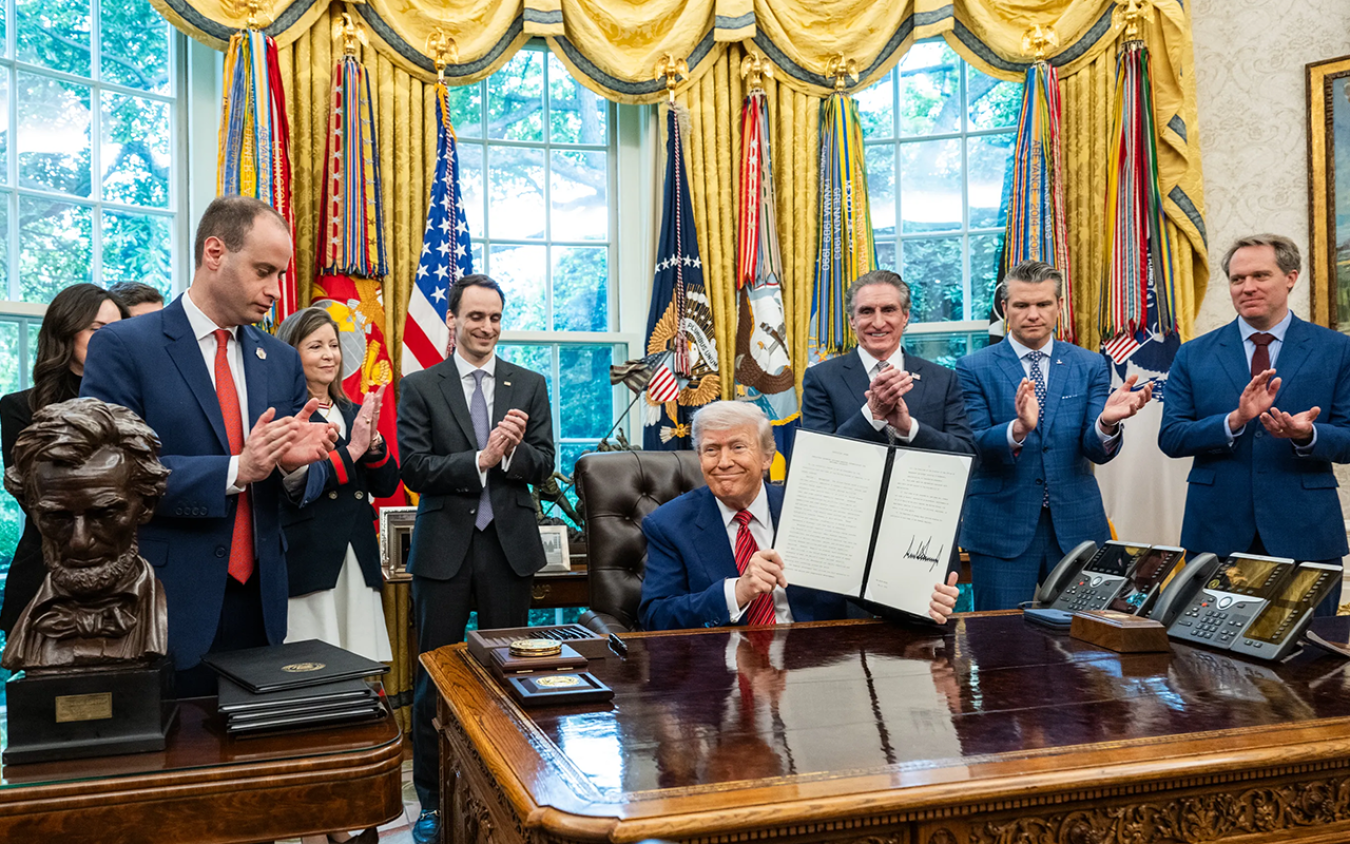 President Trump signing executive orders.