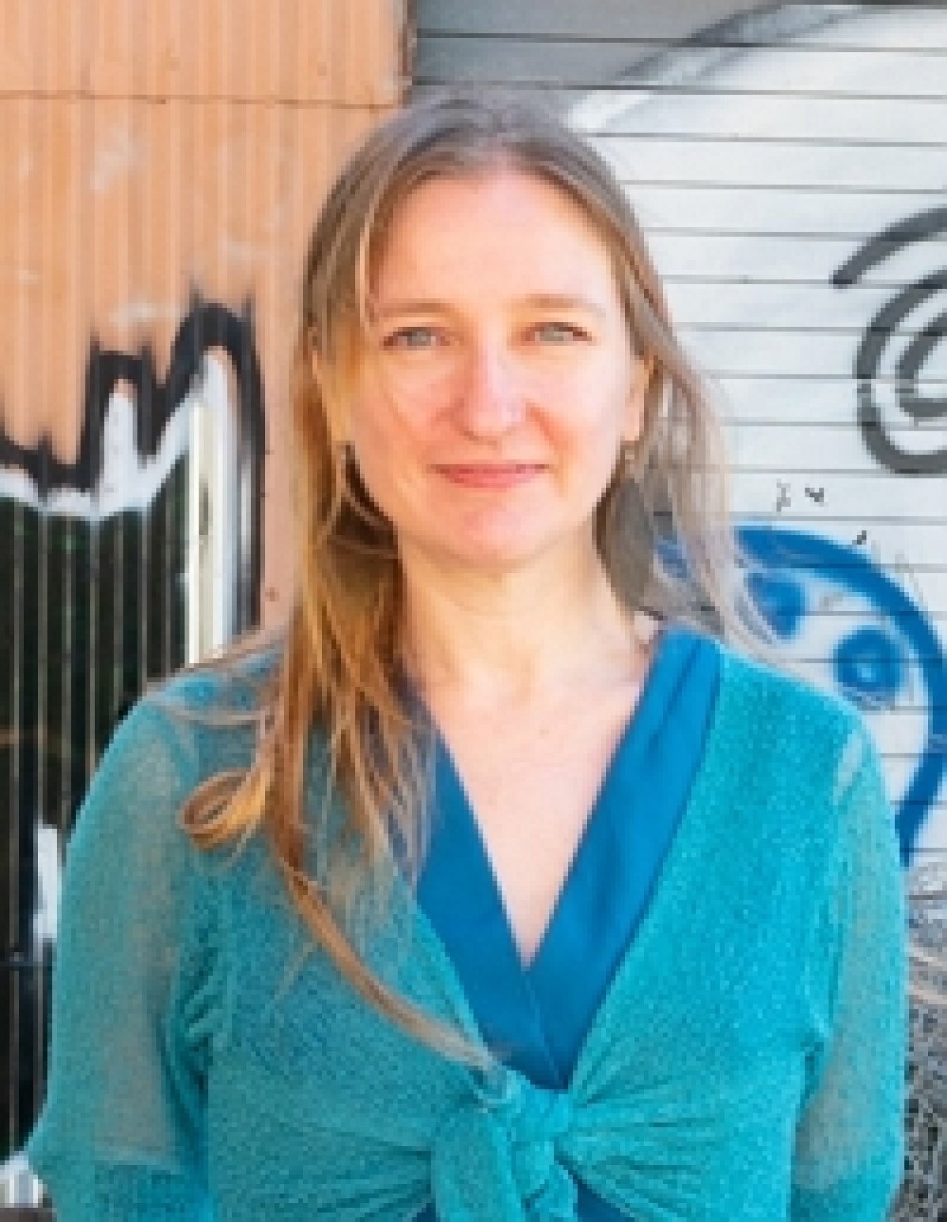 Lisa Ferretto, AIA, LEED, WELL, EcoDistricts Accredited Professional.