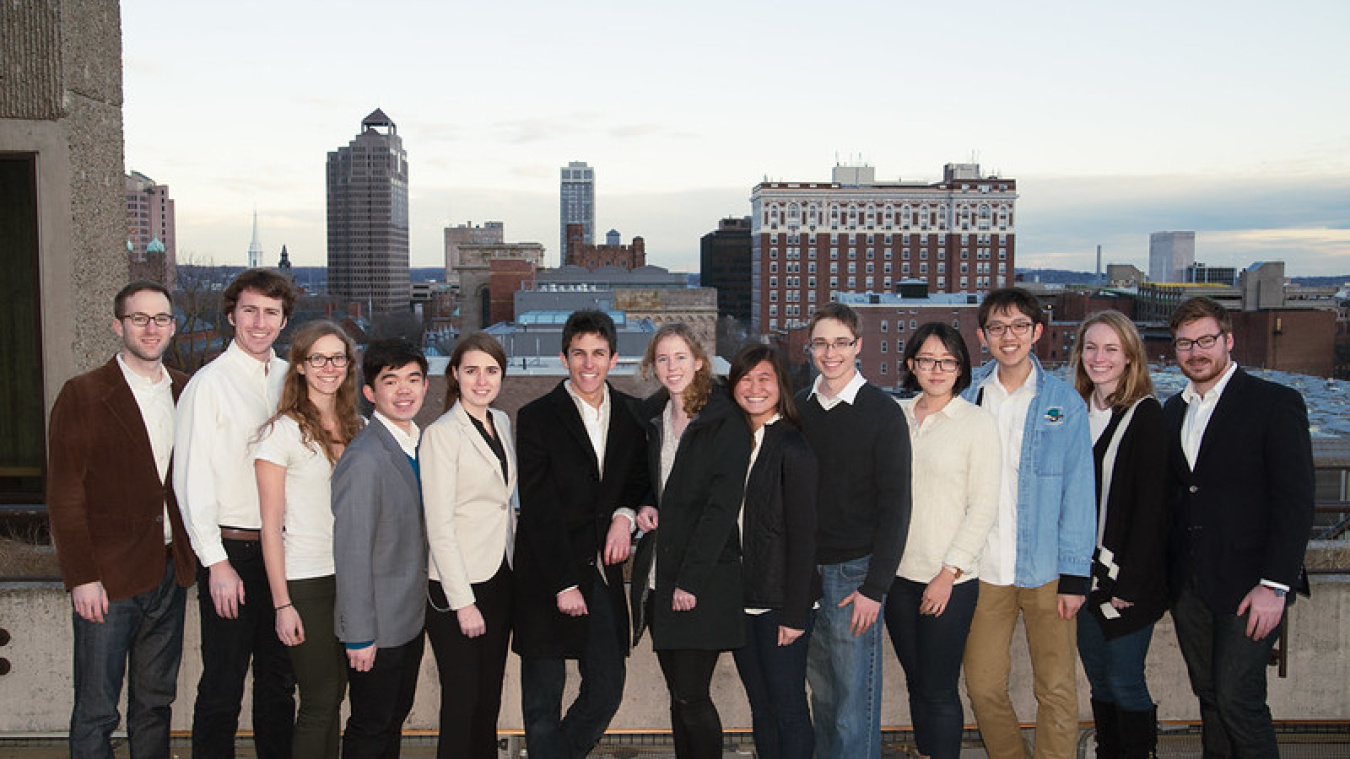 team members standing outside