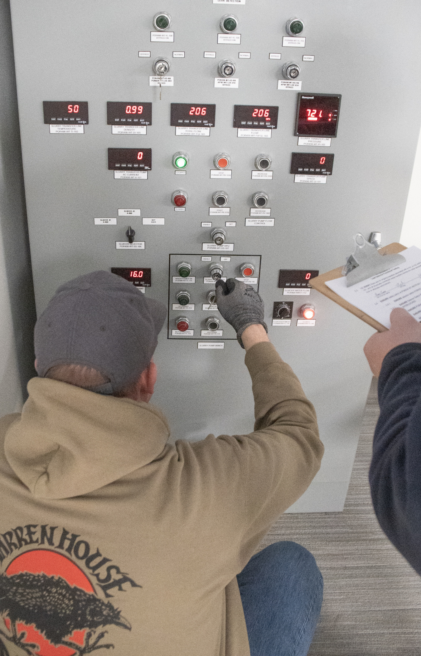 Employees conducting leak tests on a tank at the Hanford Site