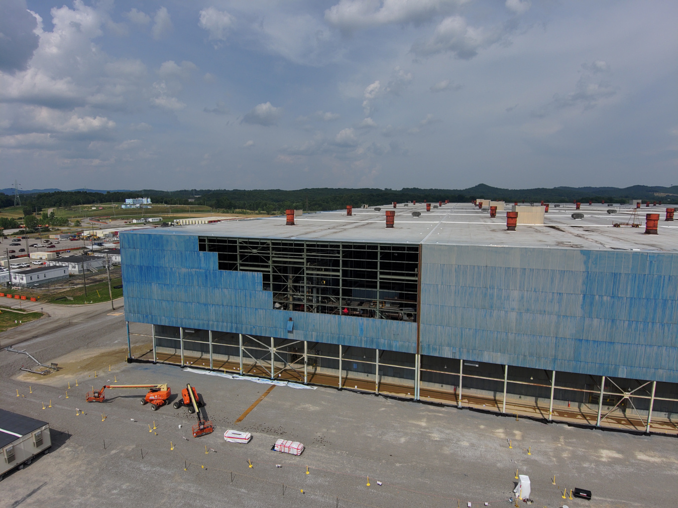 Aerial view of a large blue building at the Portsmouth Site