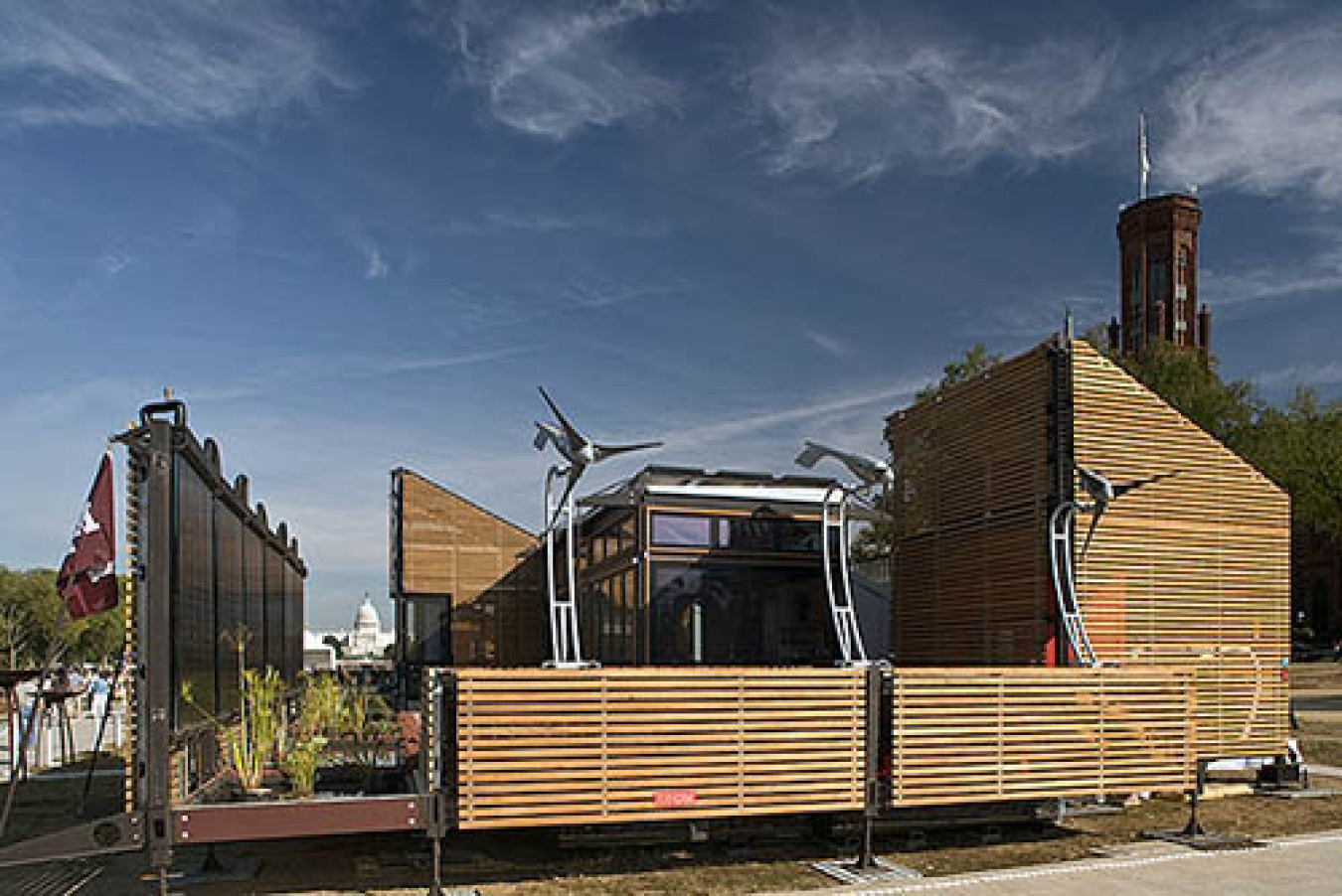 Exterior of the Texas A&M team's Build Challenge house, a structure of several different shaped sections.