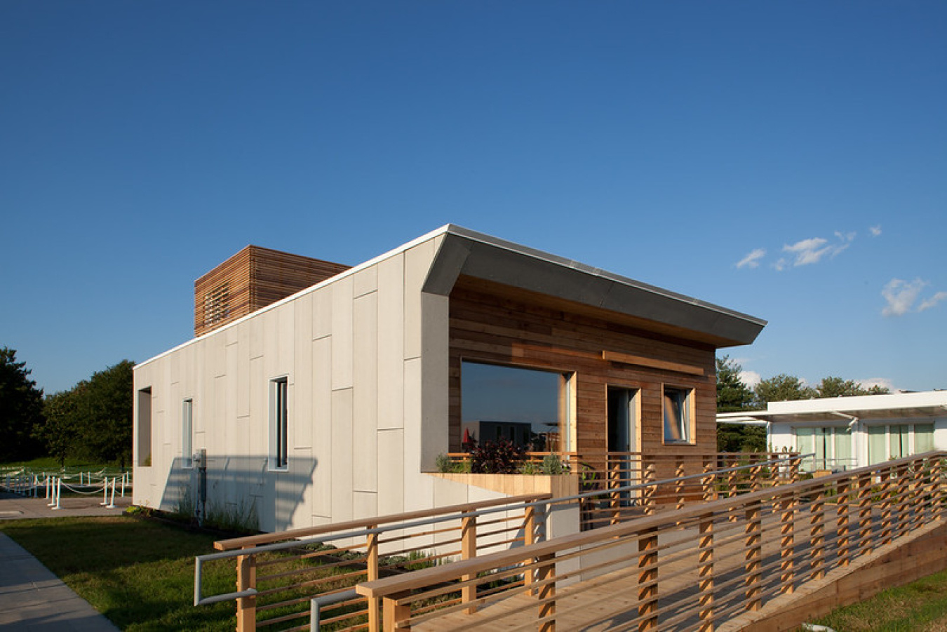 Exterior of the Parson team's Build Challenge house, showing a structure with a wheelchair ramp along the front.