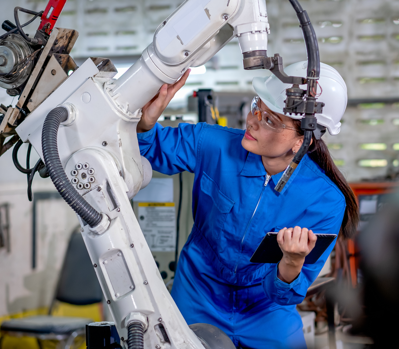 Technician inspects mechanical equipment