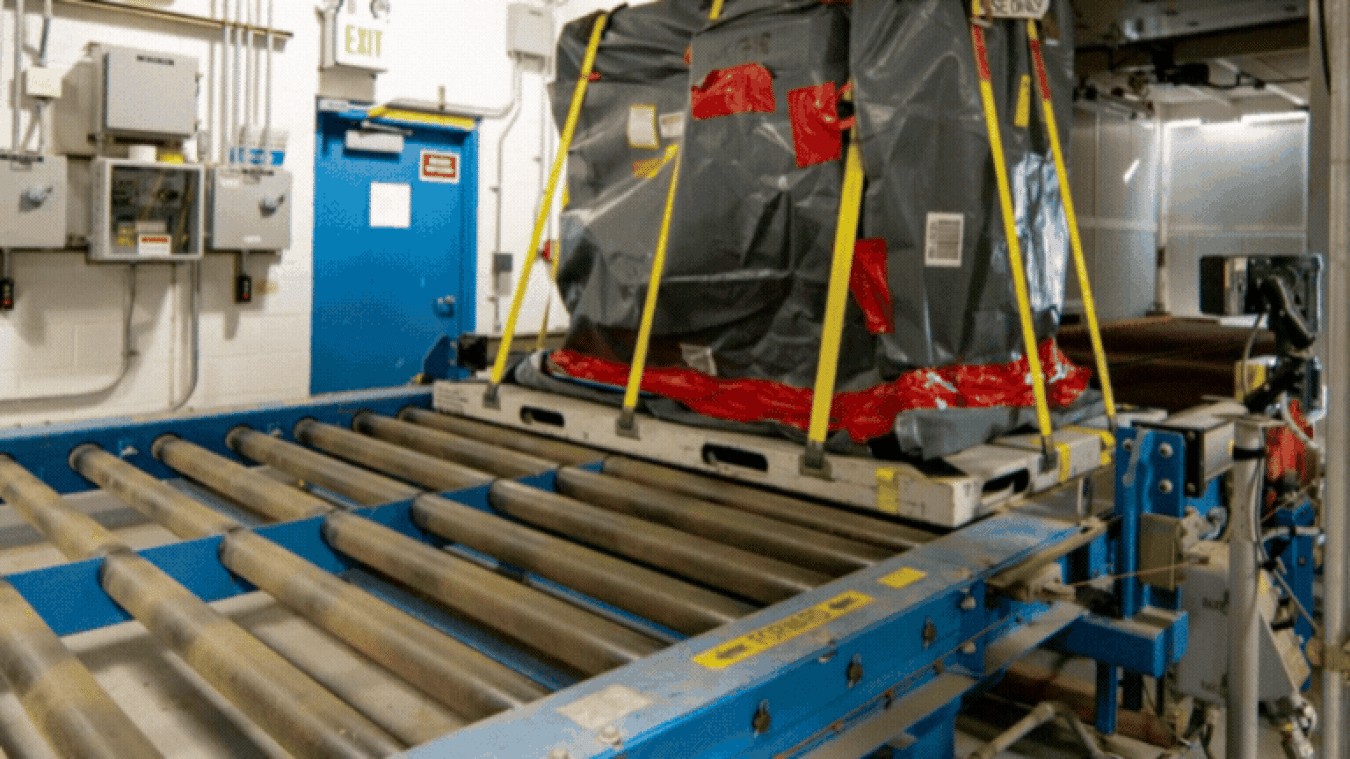 Rotating set of images of a glovebox being used