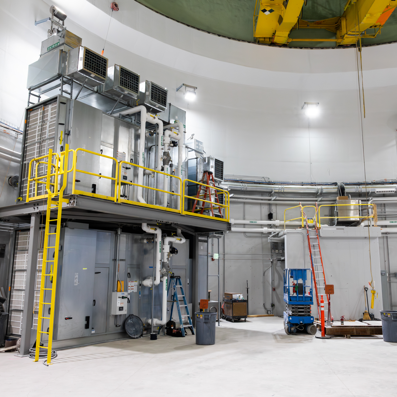 View inside the DOME microreactor test bed with white walls and industrial machinery