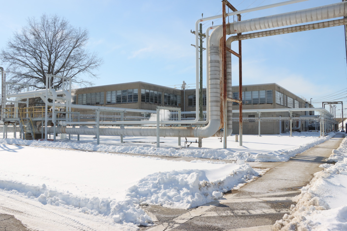 The outside of a large facility building at the Portsmouth Site with snow on the ground