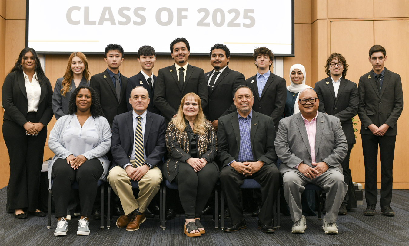 A group of professionals pose for a photo
