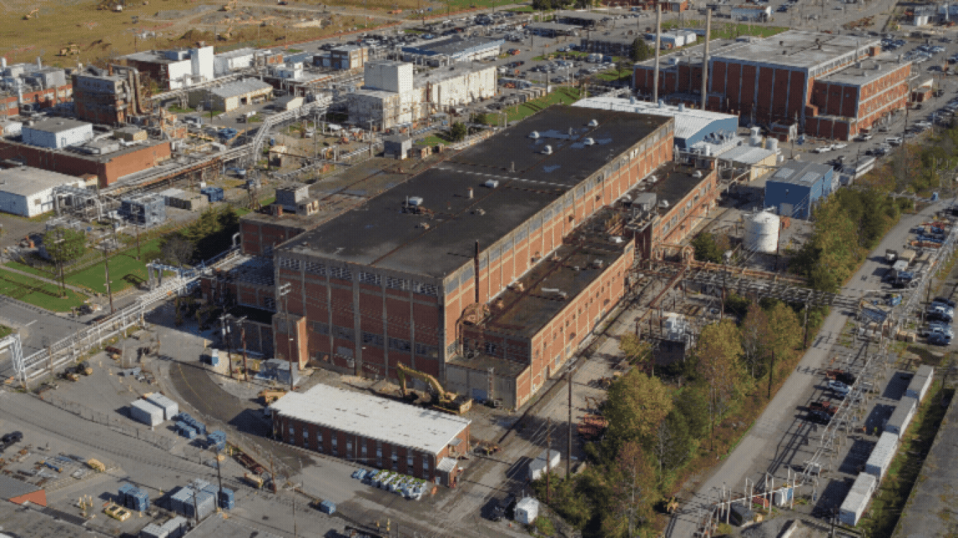 Rotating images of before and after a building demolition at the Oak Ridge Site