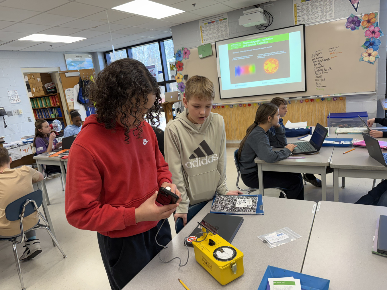 Two students working on STEM activities in a classroom