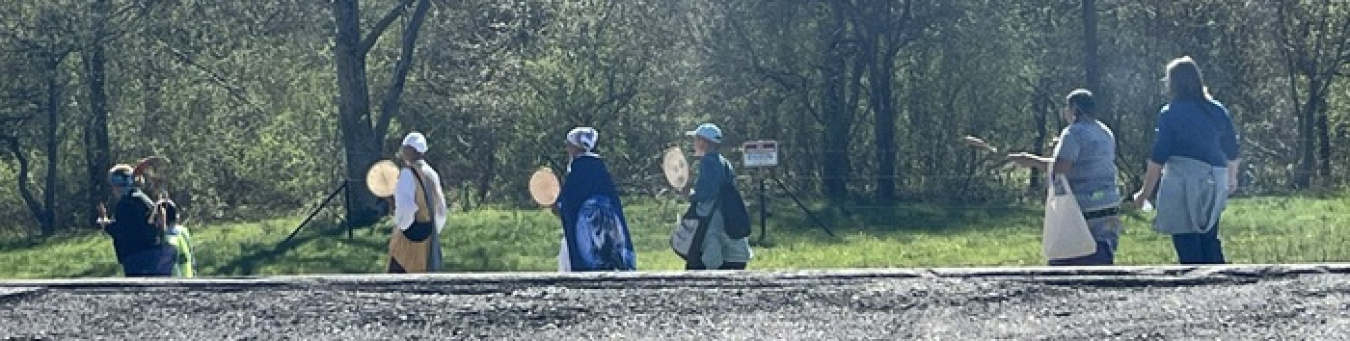 A group of people walking outside at the West Valley Site