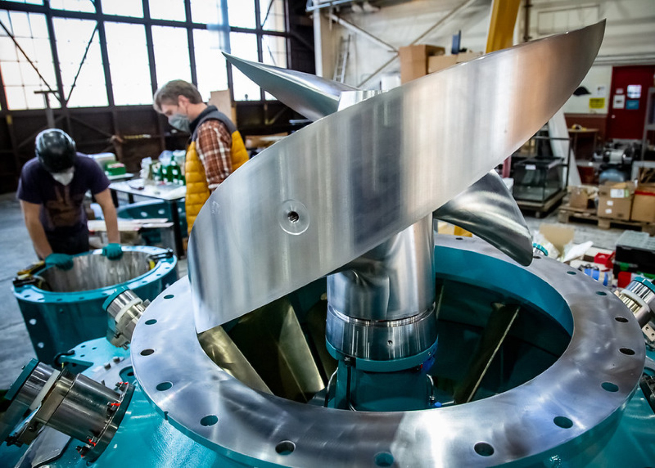 A uniquely thick and forward-swept turbine runner blade awaits the addition of the runner housing at Natel Energy's headquarters in Alameda, California.