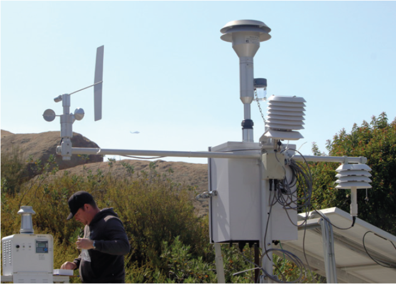 DOE contractor at air monitor station