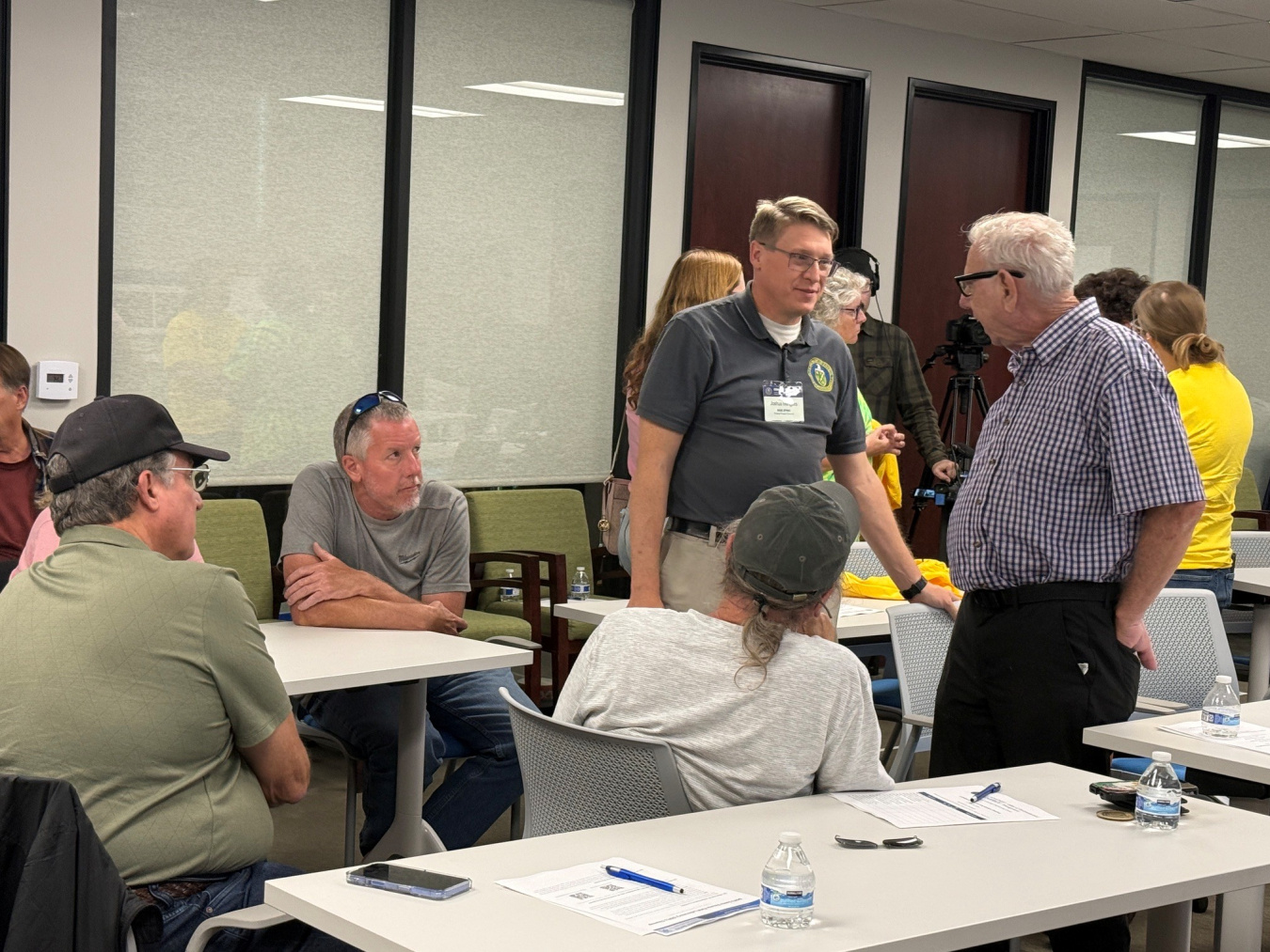 People mingling at a meeting