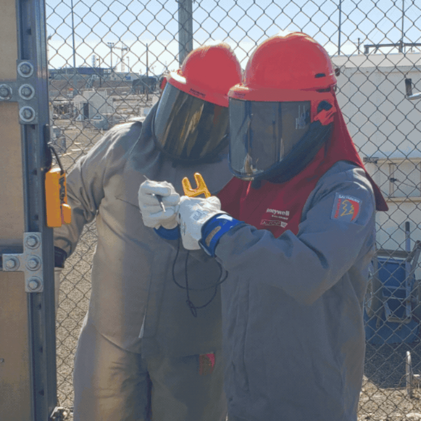Rotating set of images of employees at the Hanford Site performing maintenance on its tank farms