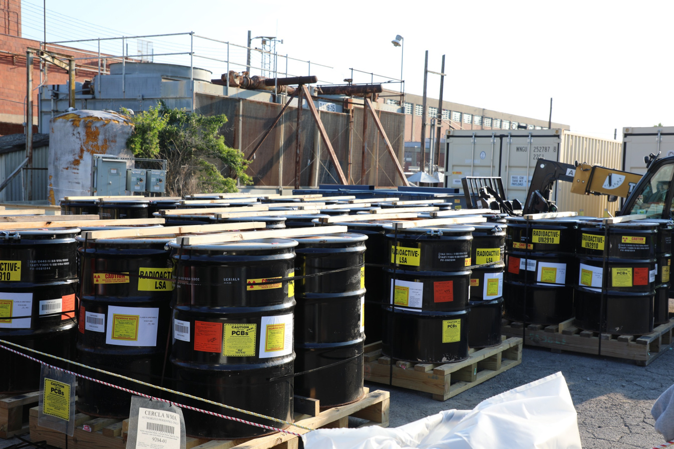 Containers of waste outside at the Oak Ridge site