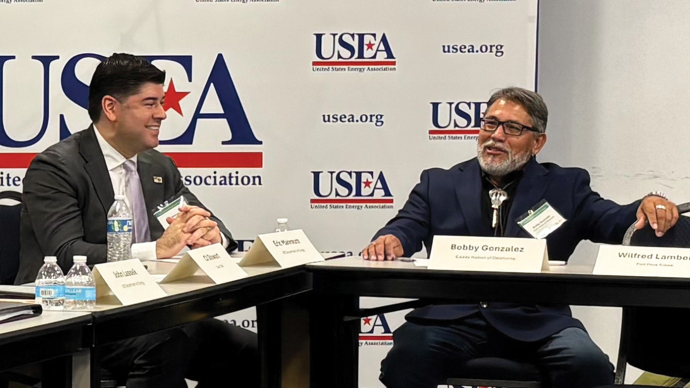 IE Director Mahroum and Caddo Nation Chairman Gonzalez speak at table