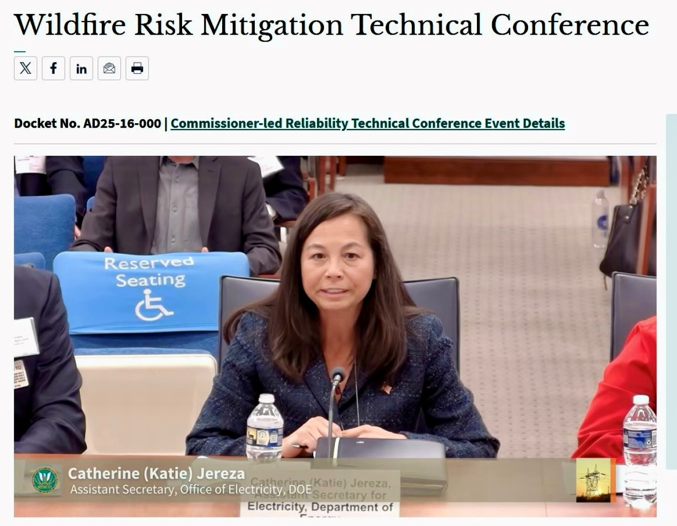 Screenshot of the Wildfire Risk Mitigation Technical Conference webpage showing a video of Catherine (Katie) Jereza, Assistant Secretary for the Department of Energy's Office of Electricity, speaking at a conference table with a microphone.