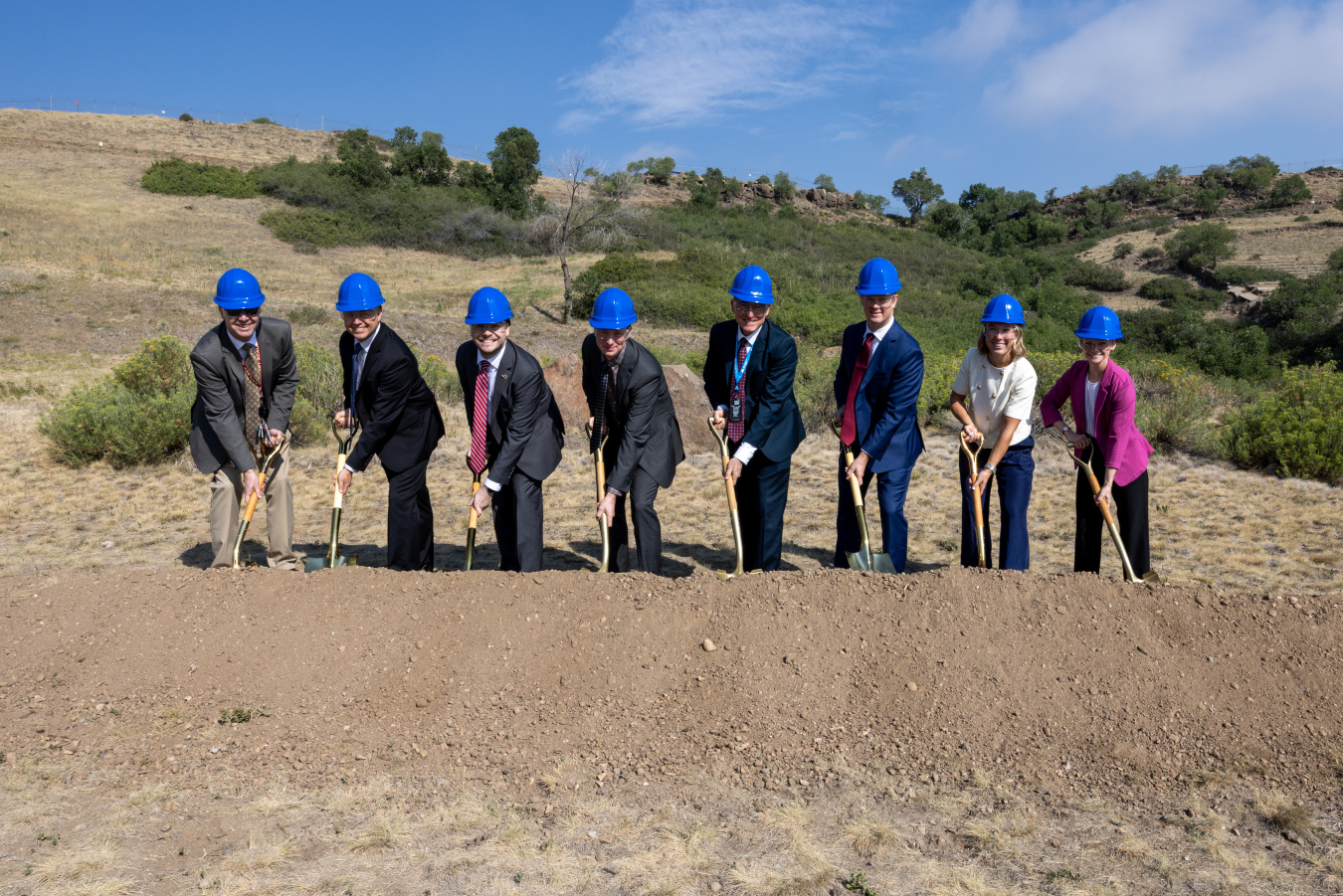 Group of officials with shovels breaking ground on the Energy Resilience Building in Colorado.