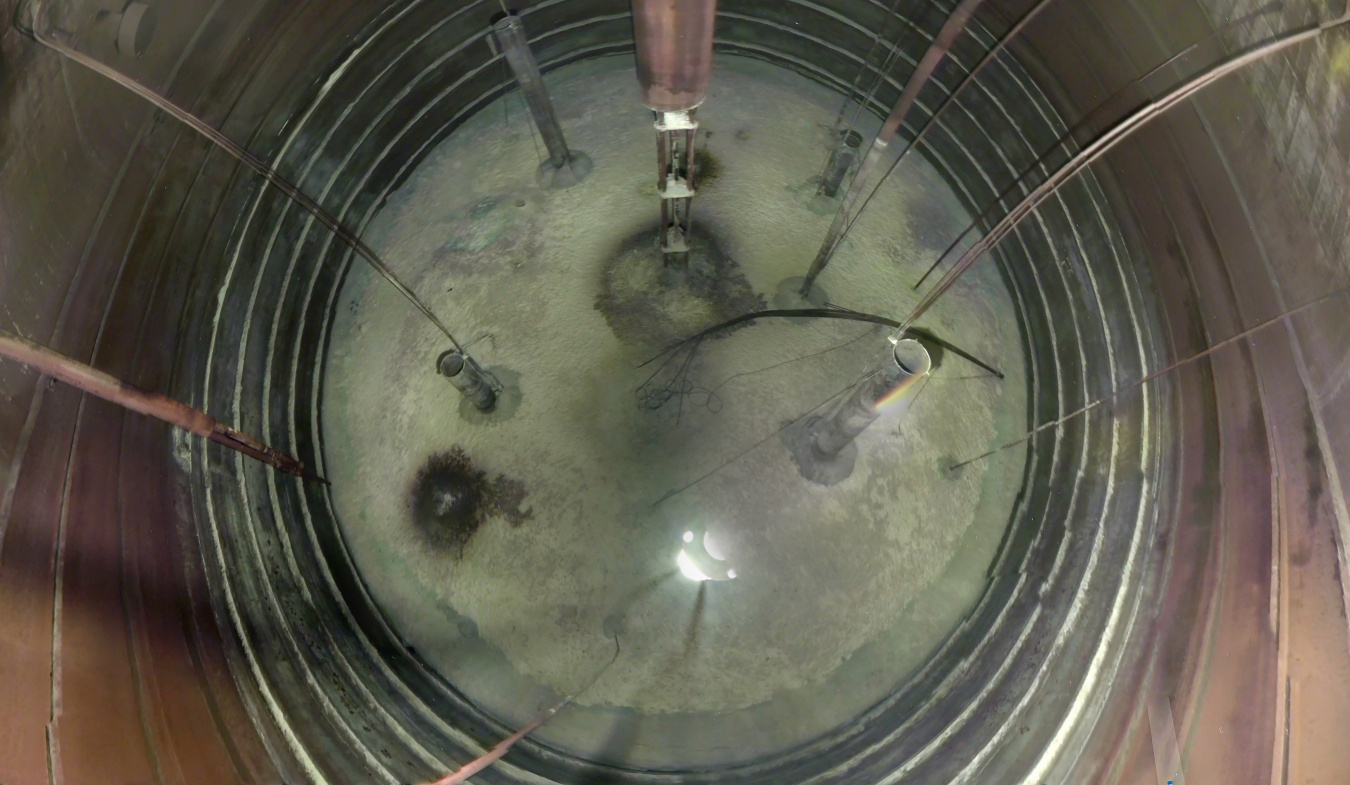 An aerial view of the inside of an emptied tank at the Hanford Site