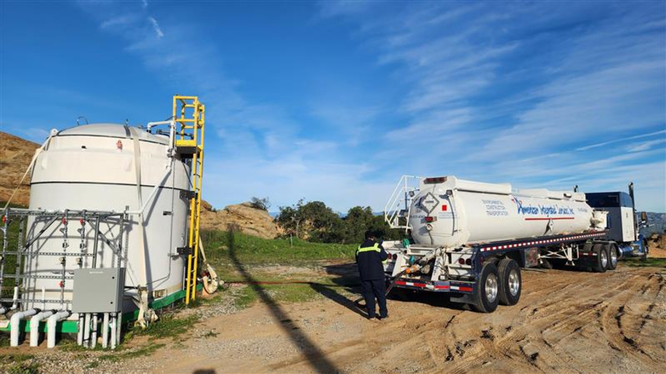 Truck collects contaminated groundwater from tank