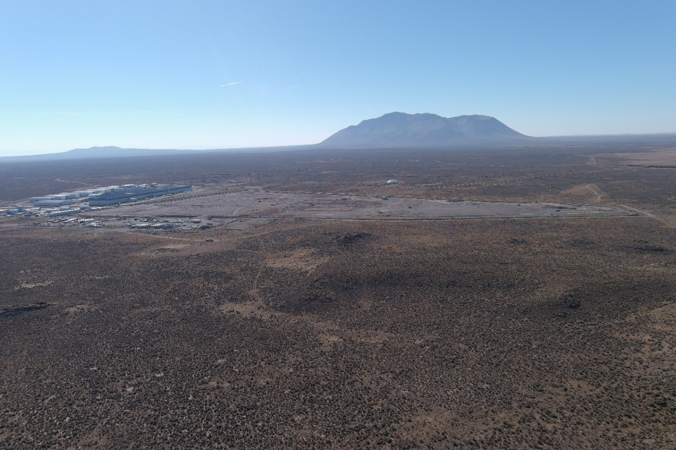 A landscape view of the Idaho Site with a mountain in the background