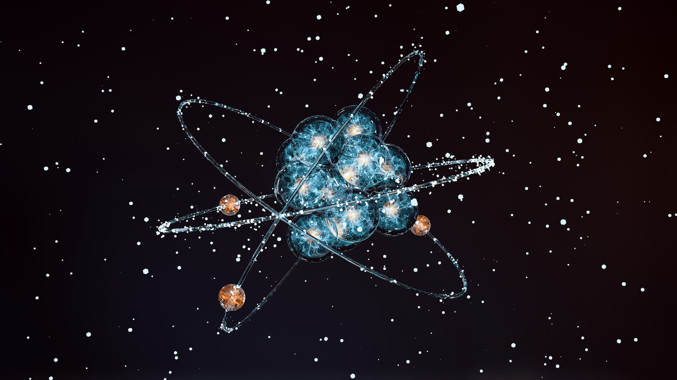 Stylized atomic model with a glowing blue nucleus and orange particles orbiting along luminous paths against a dark, star-filled background