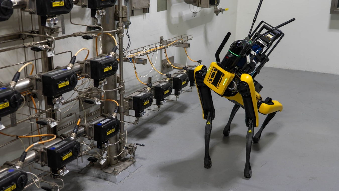 A robotic dog walking around in a laboratory 
