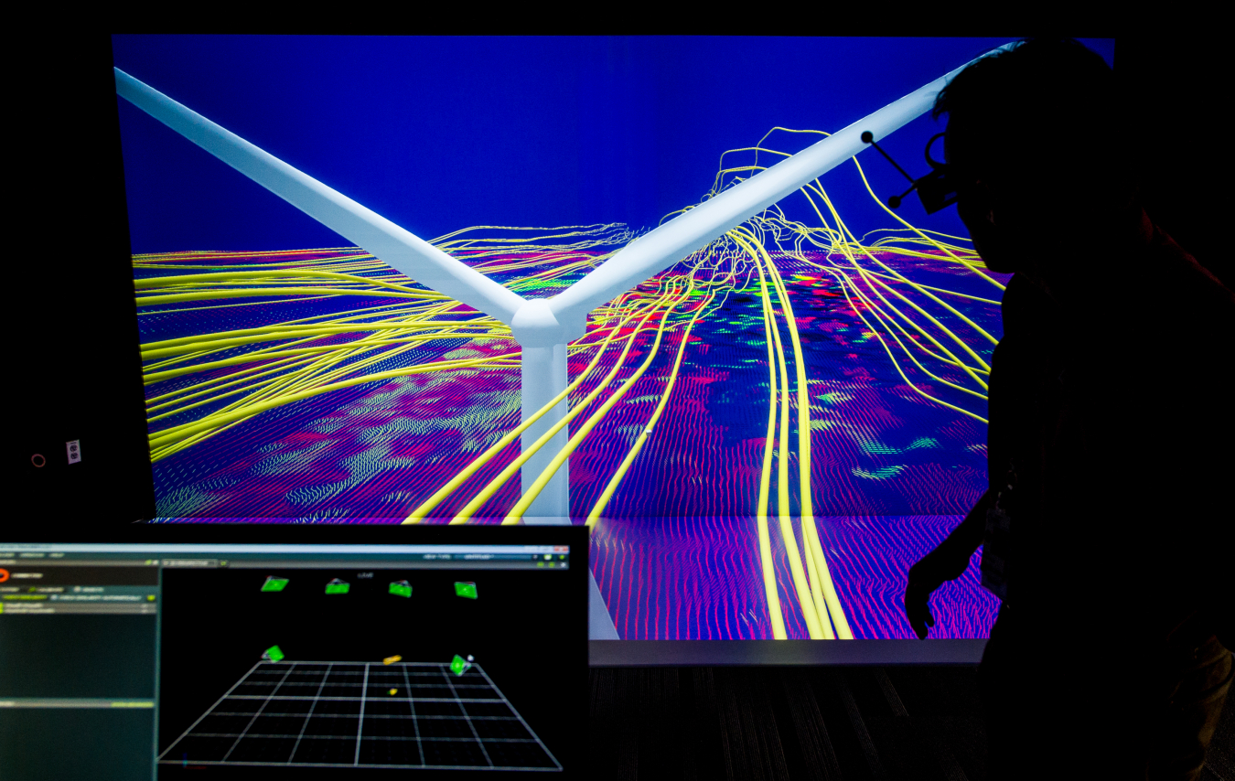 National Renewable Energy Laboratory Senior Scientist  Kenny Gruchalla examines the velocity field from from a wind turbine simulation using a 3D model at the Energy Systems Integration Facility.